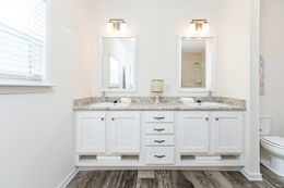 The 1714 HERITAGE Primary Bathroom. This Manufactured Mobile Home features 3 bedrooms and 2 baths.