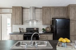 The THE BREEZE I Kitchen. This Manufactured Mobile Home features 3 bedrooms and 2 baths.