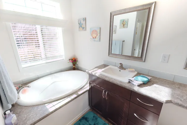 The SUM3068A Primary Bathroom. This Manufactured Mobile Home features 3 bedrooms and 2 baths.