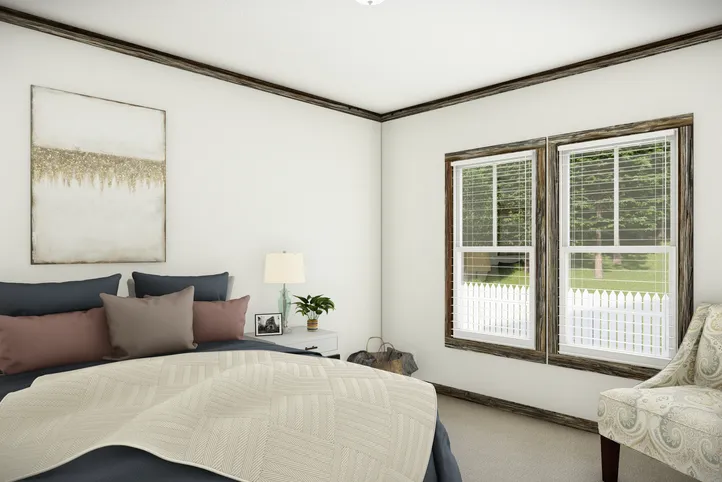 The THE SUMNER Bedroom. This Manufactured Mobile Home features 3 bedrooms and 2 baths.