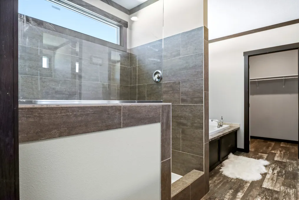 The THE ASPEN Primary Bathroom. This Manufactured Mobile Home features 3 bedrooms and 2 baths.