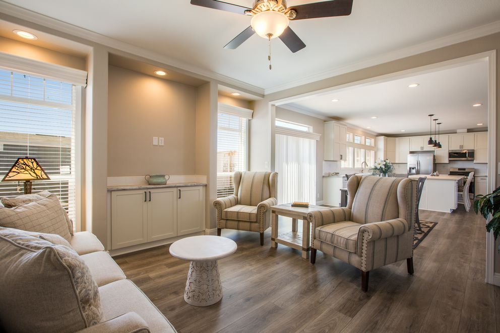 The EDGEWOOD Living Room. This Manufactured Mobile Home features 3 bedrooms and 2 baths.