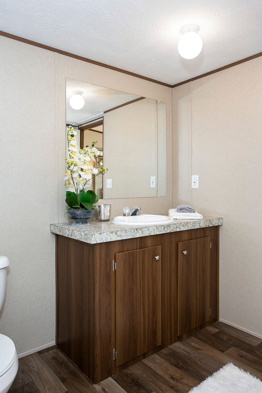 The TRIUMPH Master Bathroom. This Manufactured Mobile Home features 5 bedrooms and 3 baths.