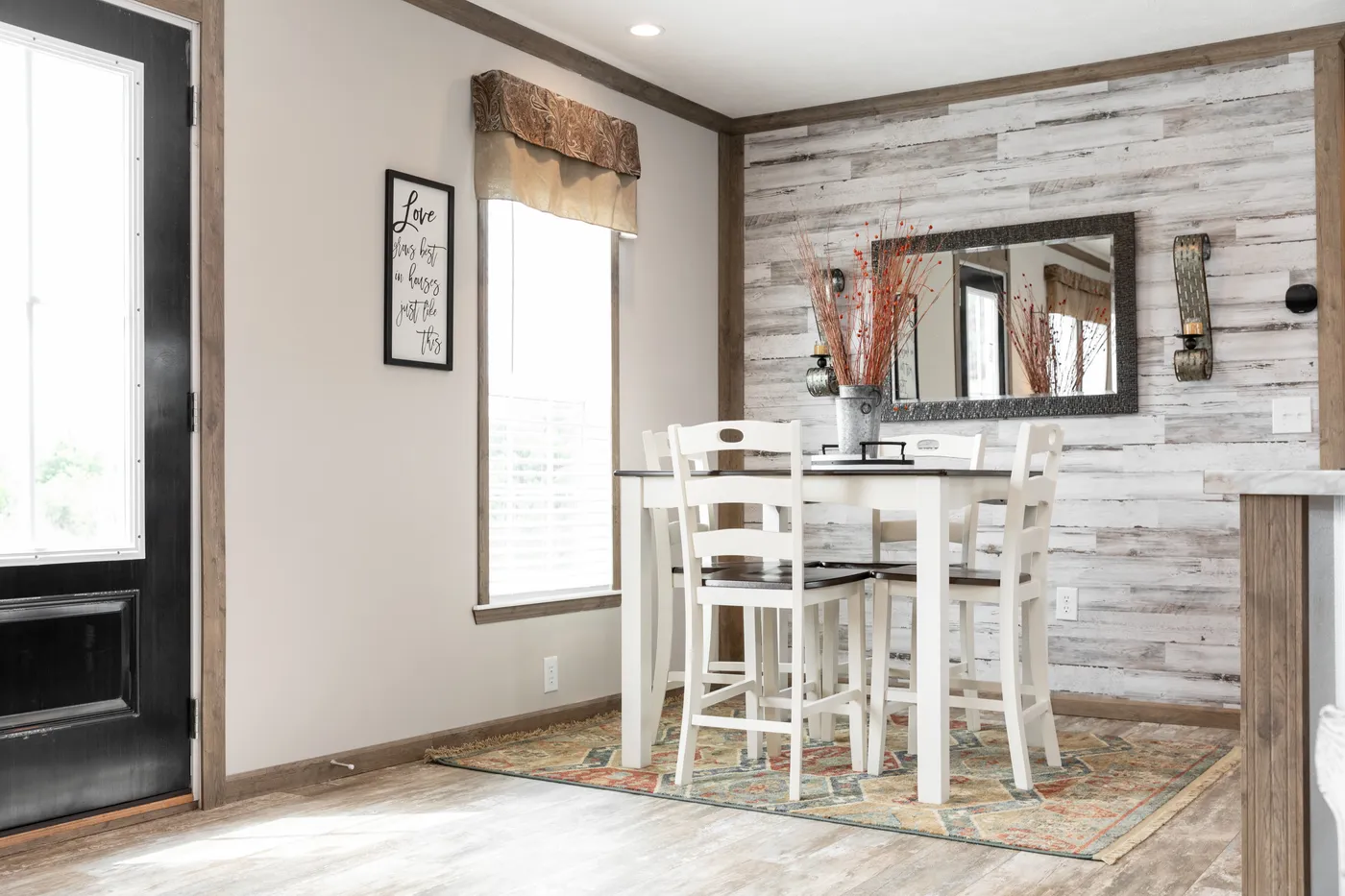 The THE MARION Dining Area. This Manufactured Mobile Home features 3 bedrooms and 2 baths.