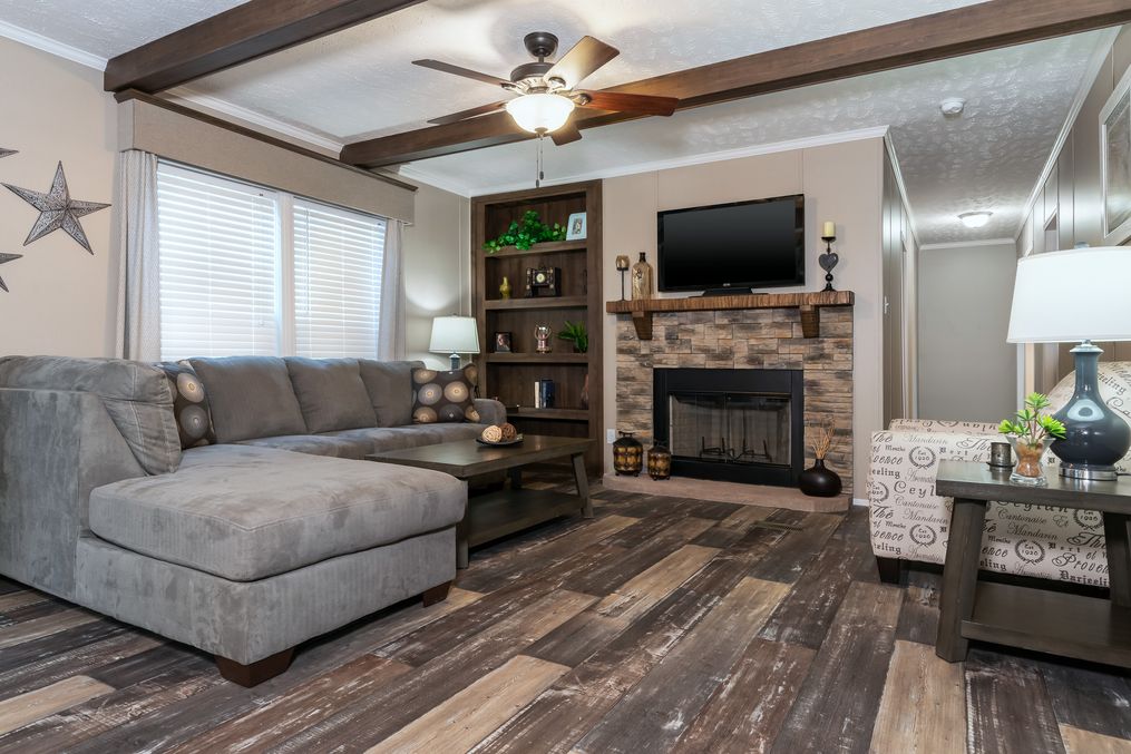 The BLACKJACK 32' Living Room. This Manufactured Mobile Home features 4 bedrooms and 2 baths.
