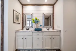 The THE EMMA JEAN Primary Bathroom. This Manufactured Mobile Home features 4 bedrooms and 3 baths.
