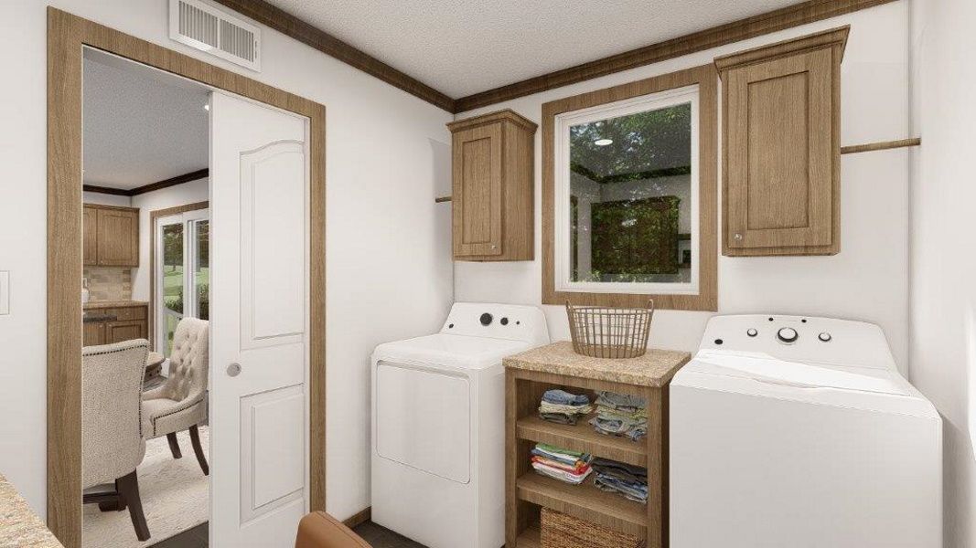 The THE WASHINGTON Utility Room. This Manufactured Mobile Home features 3 bedrooms and 2 baths.