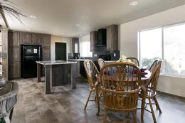 The 2022 COLUMBIA RIVER Dining Area. This Manufactured Mobile Home features 3 bedrooms and 2 baths.