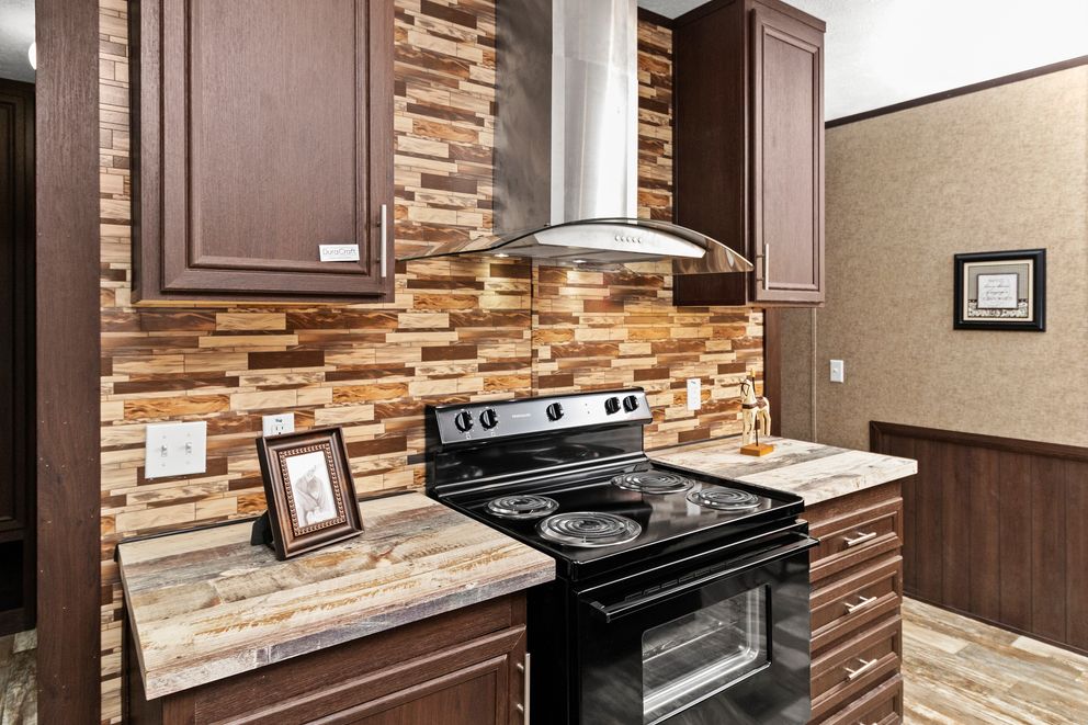 The THE PARKSIDE Kitchen. This Manufactured Mobile Home features 3 bedrooms and 2 baths.