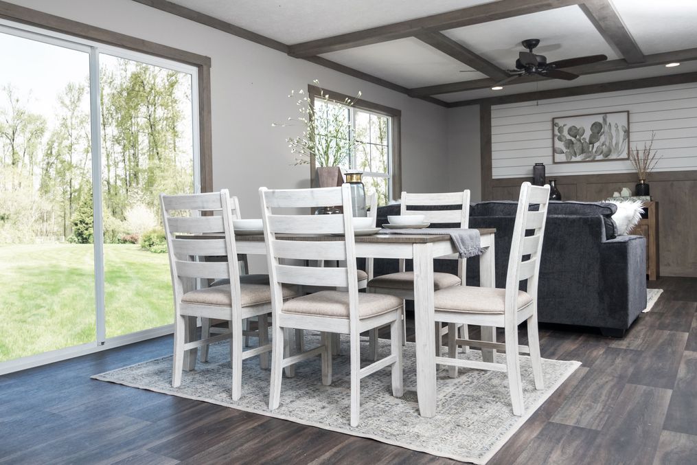 The ISABELLA Dining Area. This Manufactured Mobile Home features 3 bedrooms and 2 baths.