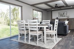 The ISABELLA Dining Area. This Manufactured Mobile Home features 3 bedrooms and 2 baths.