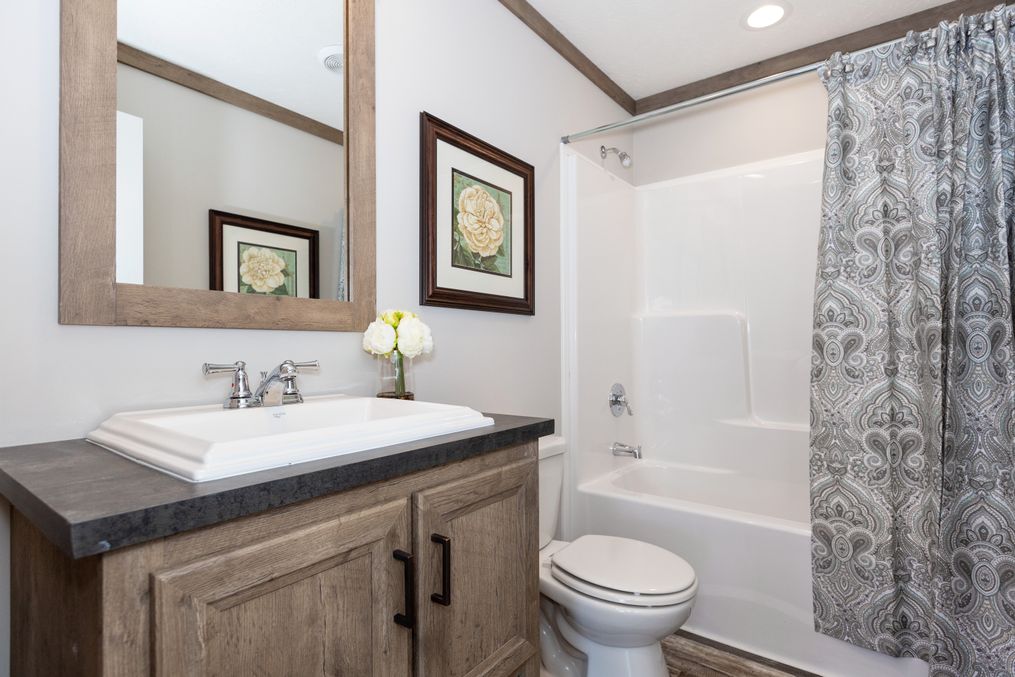 The ISABELLA Guest Bathroom. This Manufactured Mobile Home features 3 bedrooms and 2 baths.