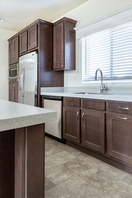 The CORONADO 3766A Kitchen. This Manufactured Mobile Home features 3 bedrooms and 2.5 baths.