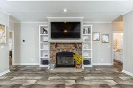 The 1714 HERITAGE Living Room. This Manufactured Mobile Home features 3 bedrooms and 2 baths.