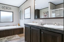 The THE REAL DEAL Master Bathroom. This Manufactured Mobile Home features 3 bedrooms and 2 baths.