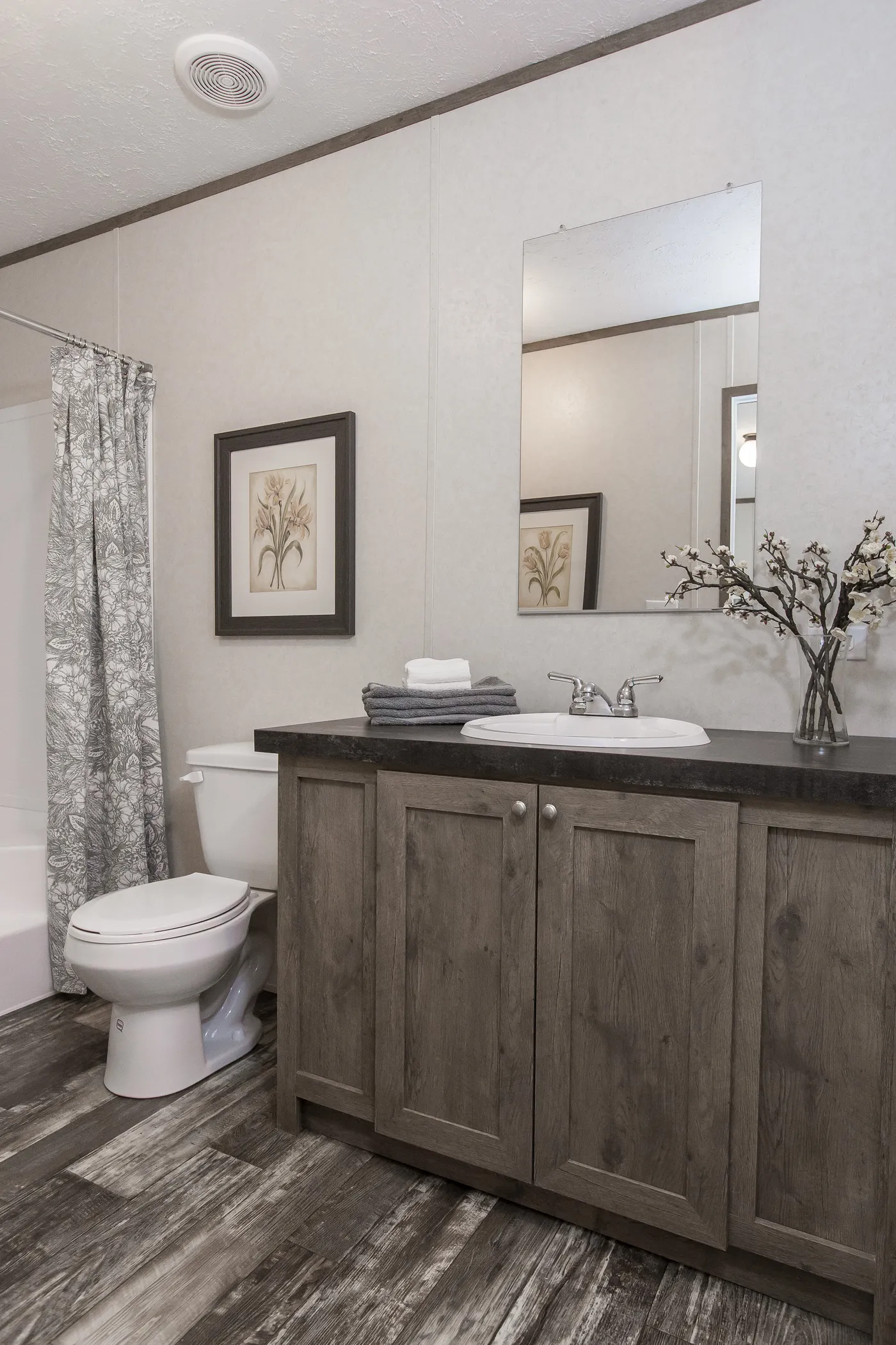 The THE BREEZE Primary Bathroom. This Manufactured Mobile Home features 3 bedrooms and 2 baths.