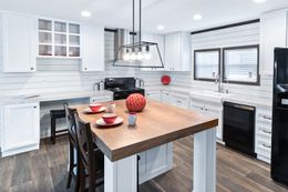 The BREEZE FARMHOUSE Kitchen. This Manufactured Mobile Home features 3 bedrooms and 2 baths.