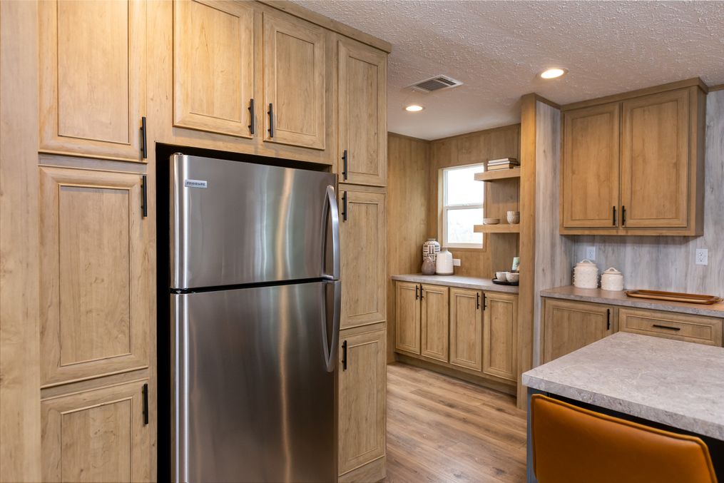 The RIO Kitchen. This Manufactured Mobile Home features 3 bedrooms and 2 baths.