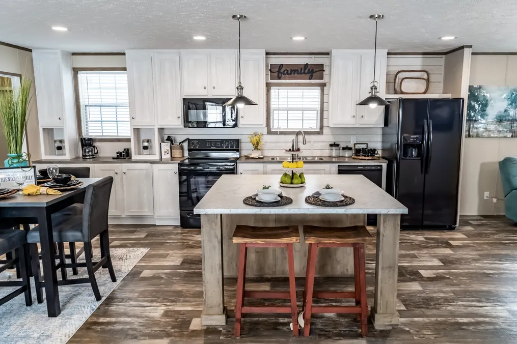 The ULTRA PRO 56B Kitchen. This Manufactured Mobile Home features 3 bedrooms and 2 baths.