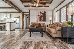 The THE AVALYN Living Room. This Manufactured Mobile Home features 3 bedrooms and 2 baths.