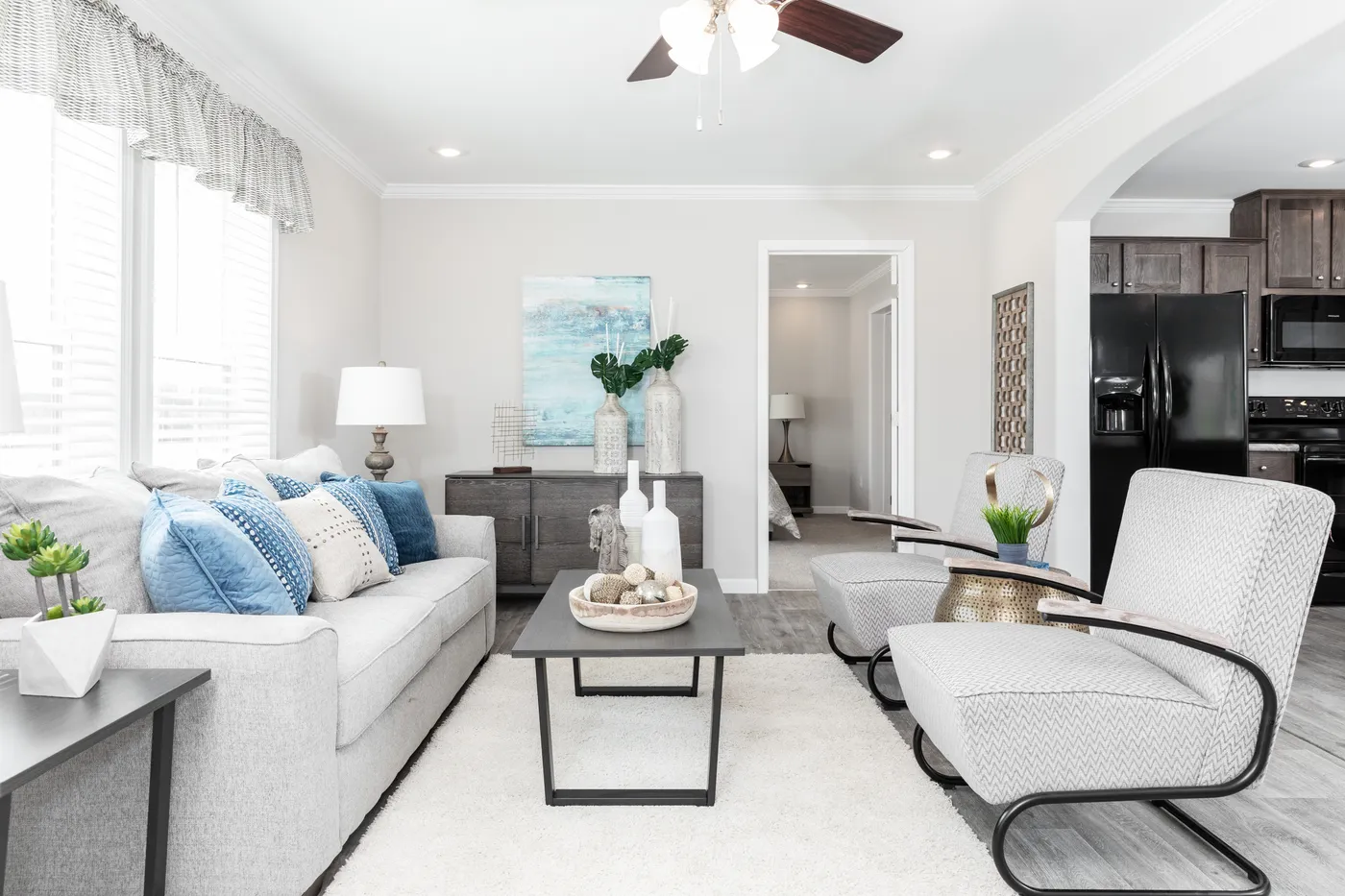 The THE VILLETTE Living Room. This Manufactured Mobile Home features 3 bedrooms and 2 baths.