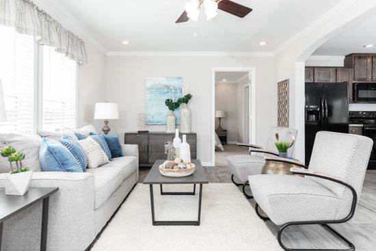 The THE VILLETTE Living Room. This Manufactured Mobile Home features 3 bedrooms and 2 baths.