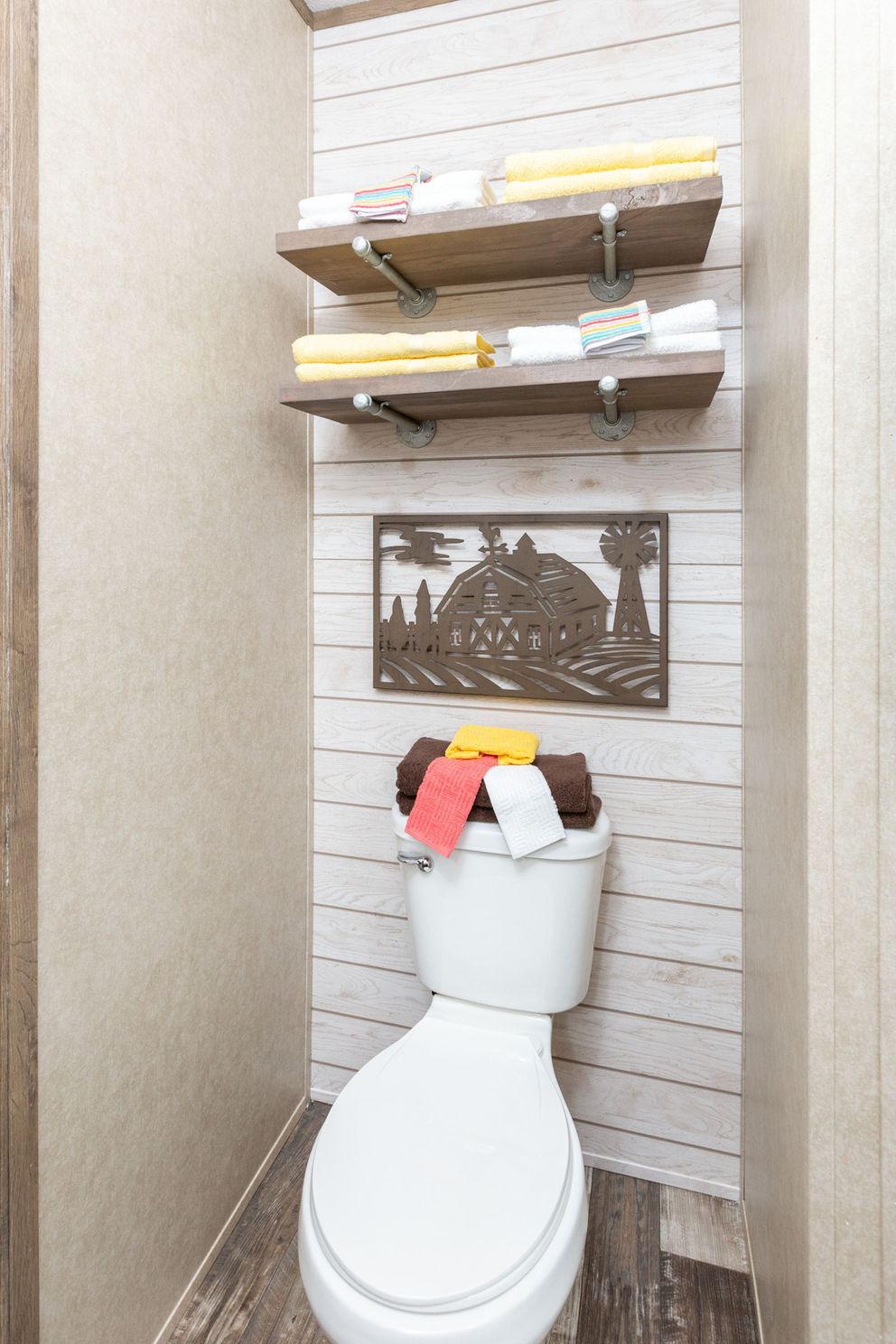 The THE RANCH HOUSE Primary Bathroom. This Manufactured Mobile Home features 3 bedrooms and 2 baths.