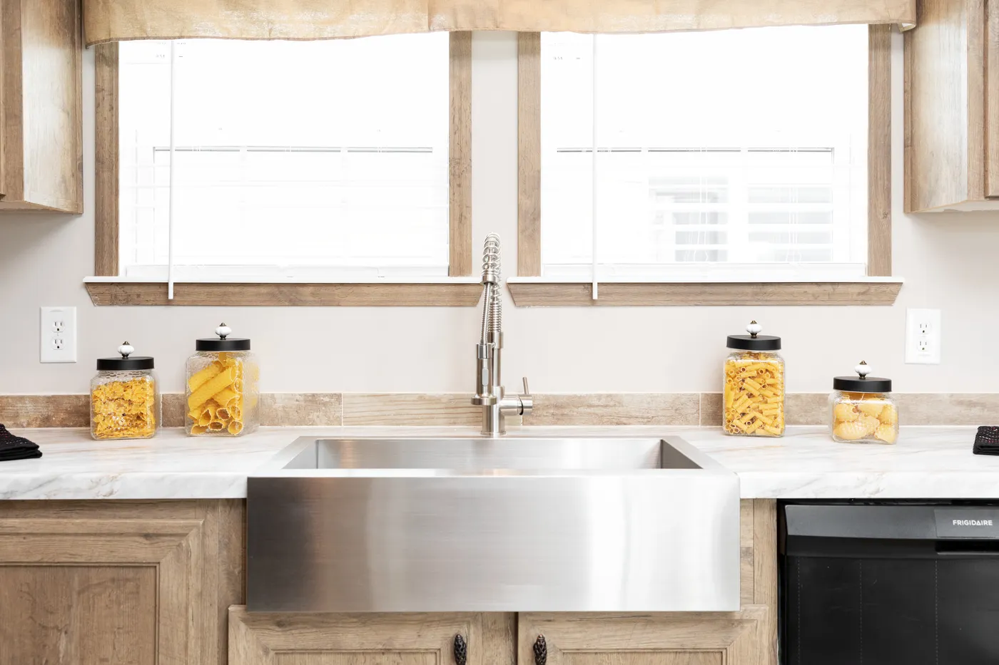 The THE MARION Kitchen. This Manufactured Mobile Home features 3 bedrooms and 2 baths.