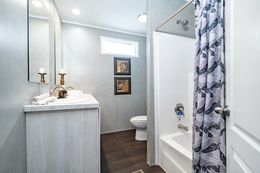 The ULTRA BREEZE 52 Guest Bathroom. This Manufactured Mobile Home features 3 bedrooms and 2 baths.