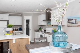 The 5621 "THE RICHMOND" 7628 Kitchen. This Manufactured Mobile Home features 4 bedrooms and 2 baths.
