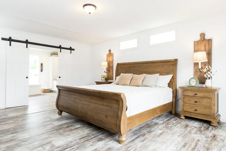 The THE LULABELLE Primary Bedroom. This Manufactured Mobile Home features 4 bedrooms and 3 baths.