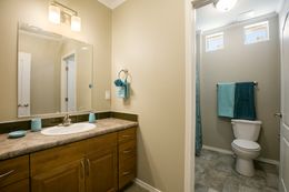 The TRANQUILITY TR3062A Guest Bathroom. This Manufactured Mobile Home features 3 bedrooms and 2 baths.
