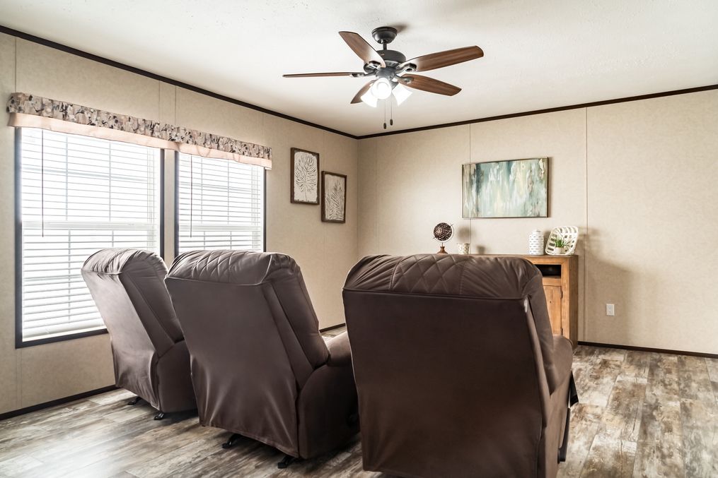 The THE TYRA Family Room. This Manufactured Mobile Home features 4 bedrooms and 2 baths.