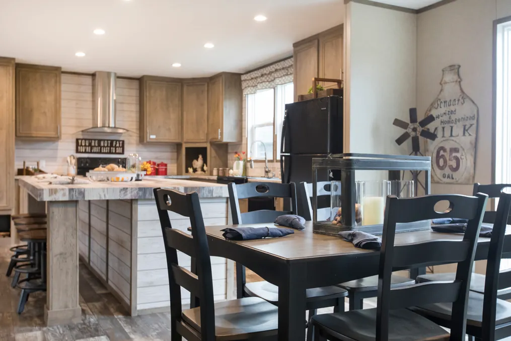 The THE CREEKWOOD Kitchen. This Manufactured Mobile Home features 4 bedrooms and 2 baths.