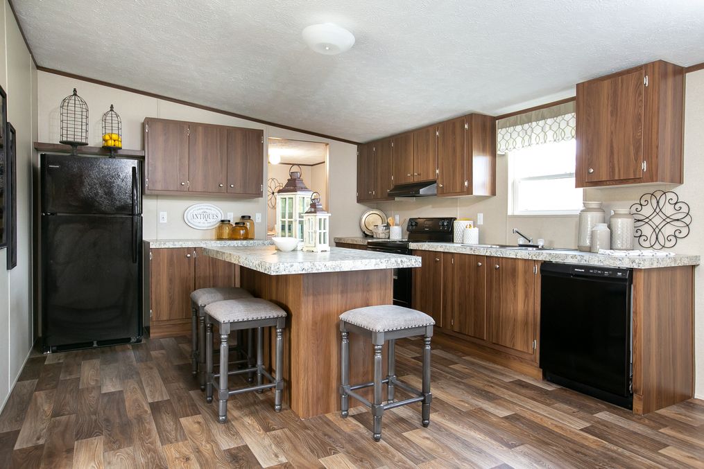 The TRIUMPH Kitchen. This Manufactured Mobile Home features 5 bedrooms and 3 baths.