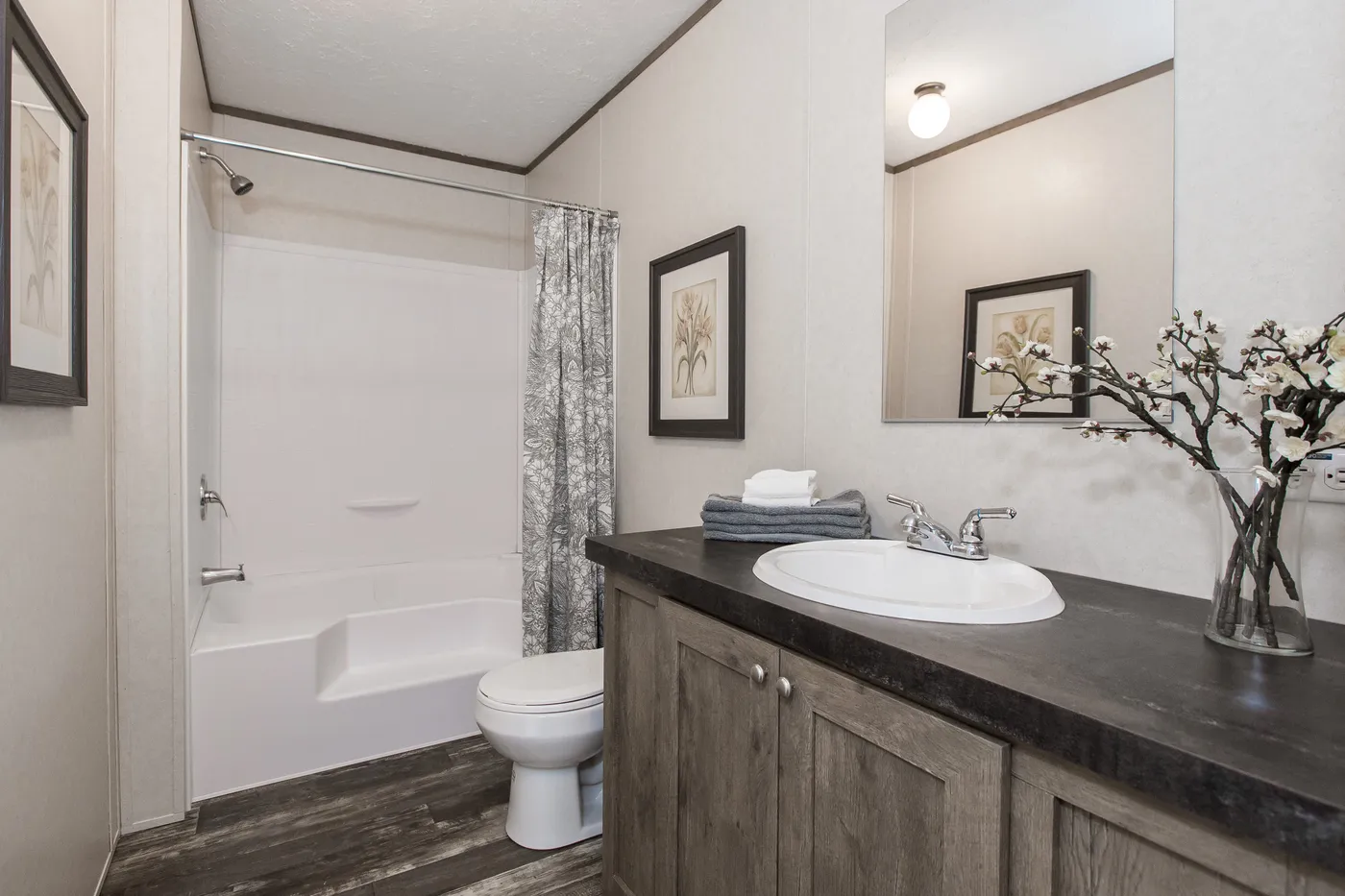 The THE BREEZE Primary Bathroom. This Manufactured Mobile Home features 3 bedrooms and 2 baths.