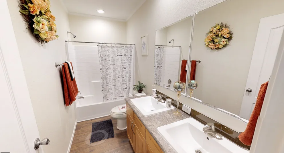The K3066A Guest Bathroom. This Manufactured Mobile Home features 3 bedrooms and 2 baths.