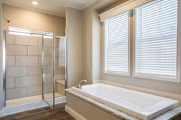 The EDGEWOOD Primary Bathroom. This Manufactured Mobile Home features 3 bedrooms and 2 baths.