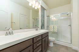 The FAIRPOINT 24564A Master Bathroom. This Manufactured Mobile Home features 4 bedrooms and 2 baths.