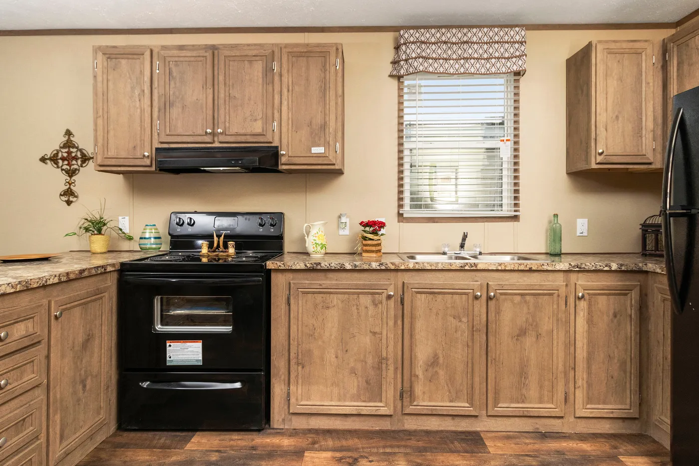 The THE HANCOCK Kitchen. This Manufactured Mobile Home features 2 bedrooms and 2 baths.
