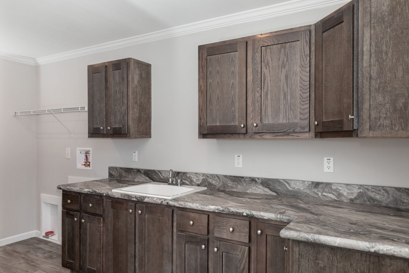 The THE VILLETTE Utility Room. This Manufactured Mobile Home features 3 bedrooms and 2 baths.