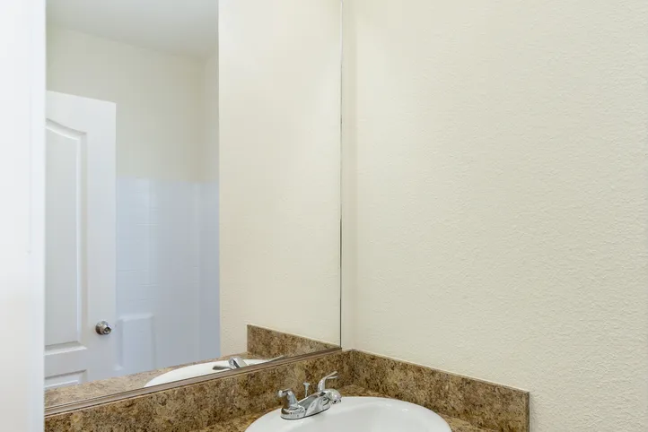 The FAIRPOINT 20523B Guest Bathroom. This Manufactured Mobile Home features 3 bedrooms and 2 baths.
