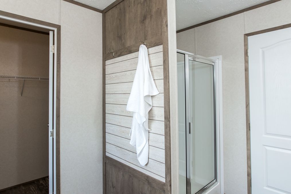 The THE BREEZE II Master Bathroom. This Manufactured Mobile Home features 4 bedrooms and 2 baths.