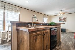 The THE CORNERBACK Kitchen. This Manufactured Mobile Home features 2 bedrooms and 1 bath.