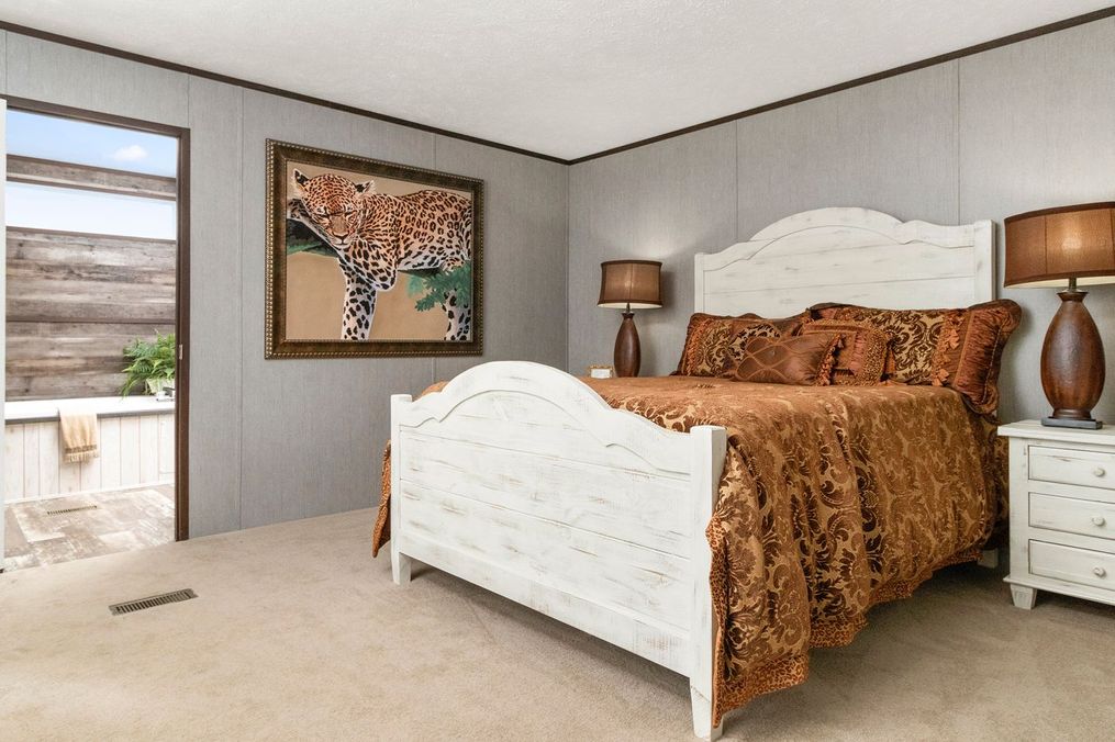 The THE SEASIDE Primary Bedroom. This Manufactured Mobile Home features 3 bedrooms and 2 baths.