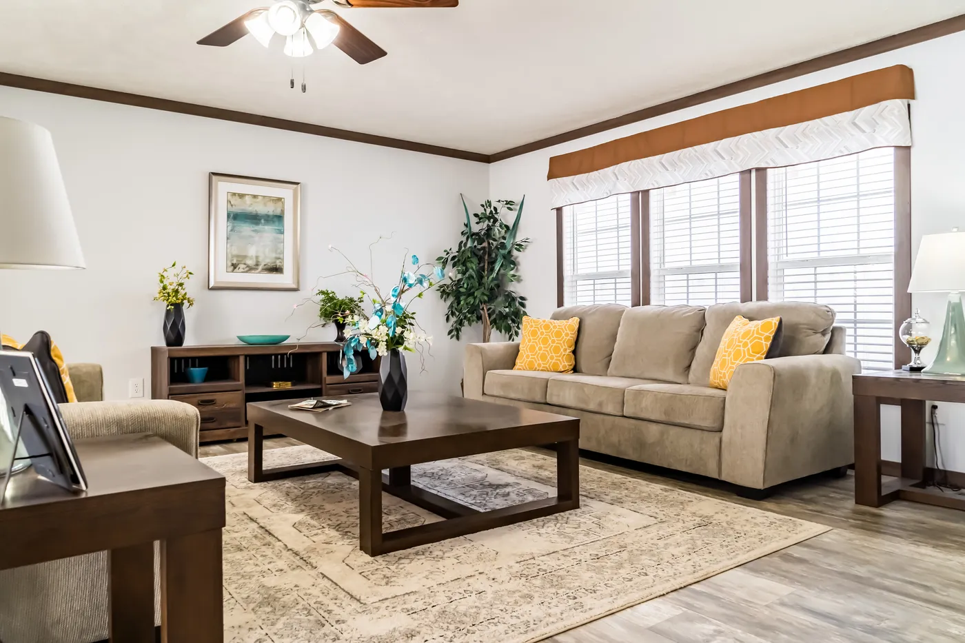 The THE TURNER Living Room. This Manufactured Mobile Home features 3 bedrooms and 2 baths.