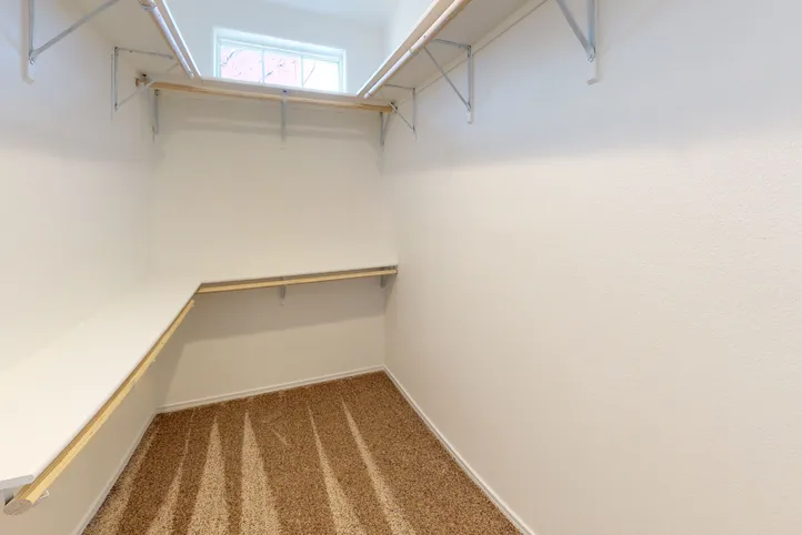 The SUM3068A Primary Bedroom. This Manufactured Mobile Home features 3 bedrooms and 2 baths.