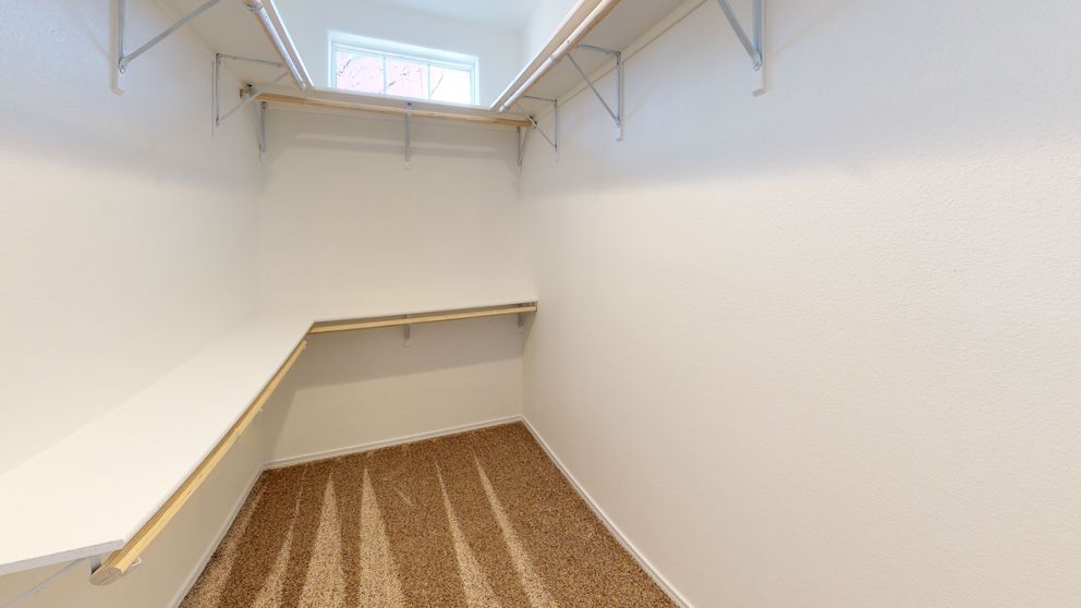 The SUM3068A Primary Bedroom. This Manufactured Mobile Home features 3 bedrooms and 2 baths.