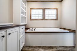The THE BOBBY JO Primary Bathroom. This Manufactured Mobile Home features 3 bedrooms and 2 baths.