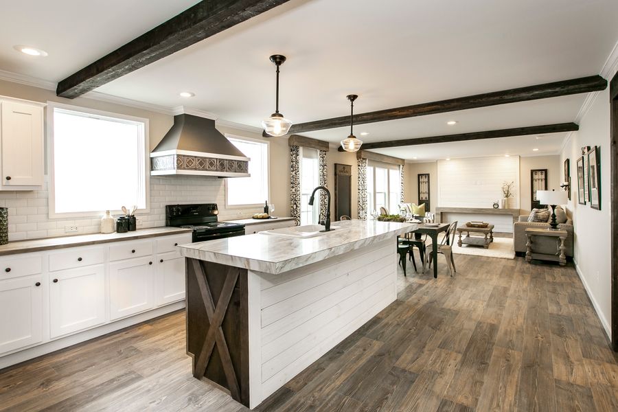 The FREEDOM FARM HOUSE  32X60 Kitchen. This Manufactured Mobile Home features 3 bedrooms and 2 baths.
